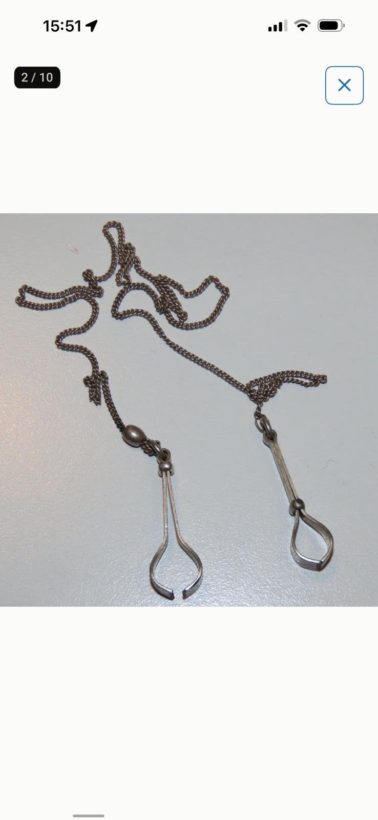 Antieke zilveren handschoen- of manchetclips met ketting, Ophalen of Verzenden, Zilver
