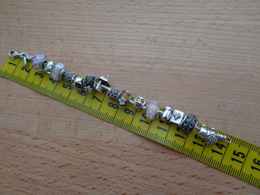 zilveren SIMKIDS kinder armband met 15 bedels [192], Sieraden, Tassen en Uiterlijk, Verzenden, Zo goed als nieuw, Met bedels of kralen
