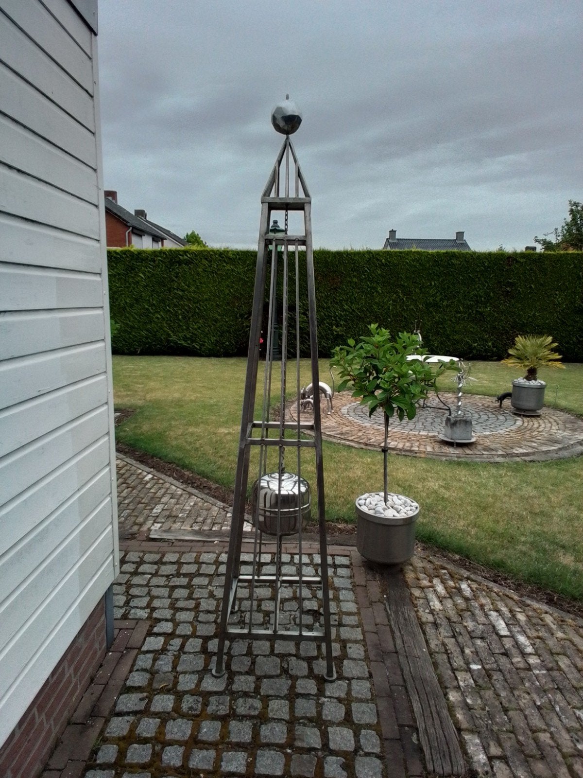 RVS tuinornament, Ophalen