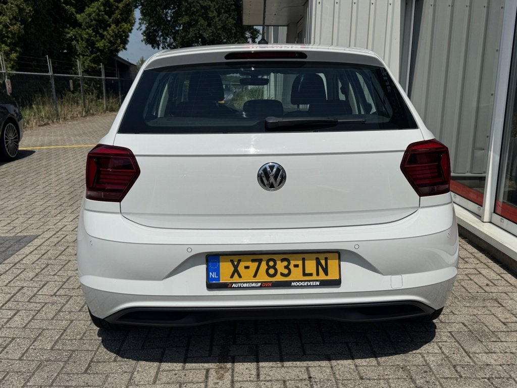 Volkswagen Polo 1.0 / Stoelverwarm / Cruise / Airco / Parkee, Auto's, 65 pk, 1005 kg, Euro 6, Met garantie (alle)