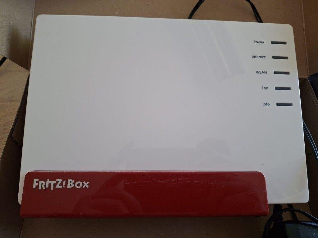 FRITZ!Box 7581 Router met modem, Computers en Software, Routers en Modems, Gebruikt, Router met modem, Ophalen