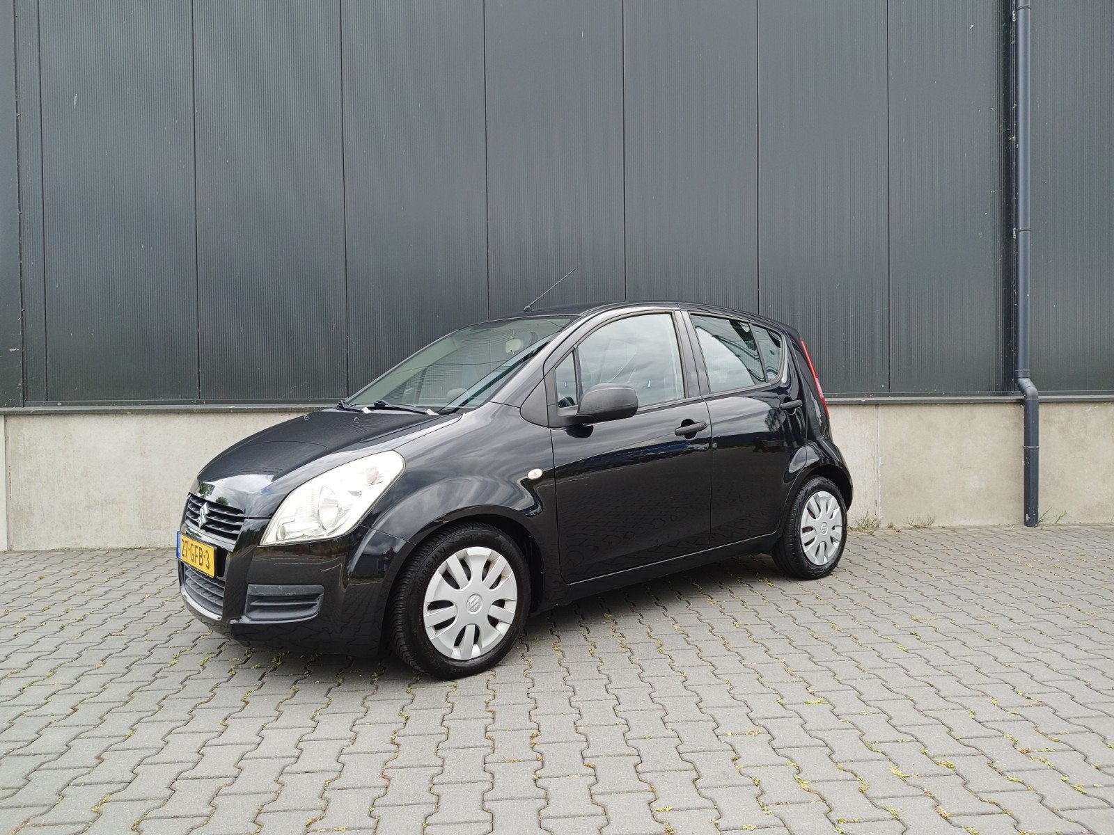 Suzuki Splash 1.0 Airco Zwart 148.731 km NAP!, Stof, 31 €/maand, Elektrische ramen, Origineel Nederlands