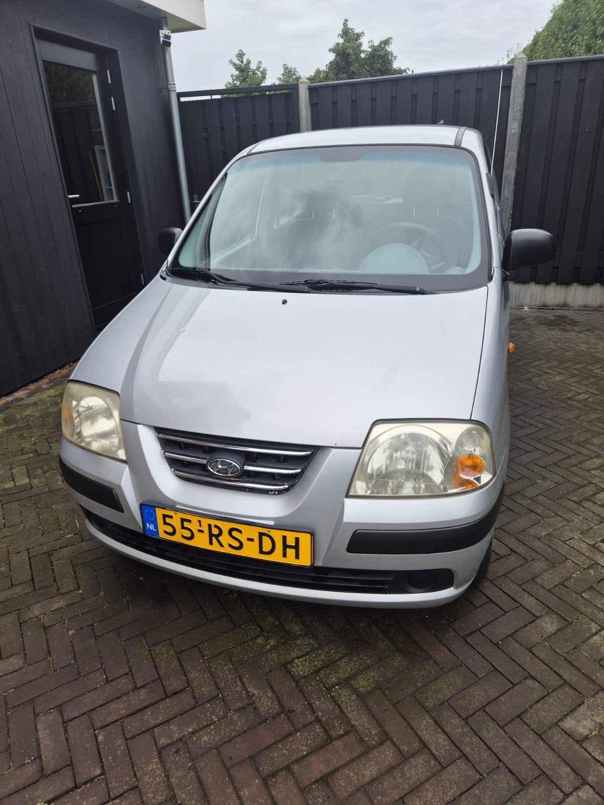 Hyundai Atos 1.1 2005 Grijs, Auto's, Voorwielaandrijving, 31 €/maand, 4 cilinders, Origineel Nederlands