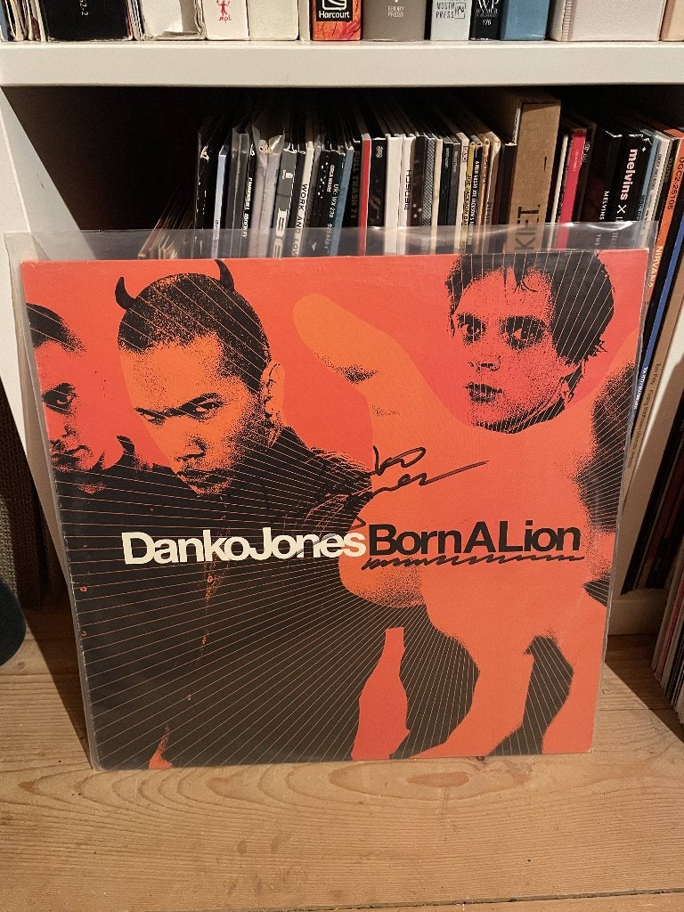 Danko Jones - Born a Lion oranje vinyl (gesigneerd), Zo goed als nieuw, 12 inch, Originele persing, Ophalen of Verzenden