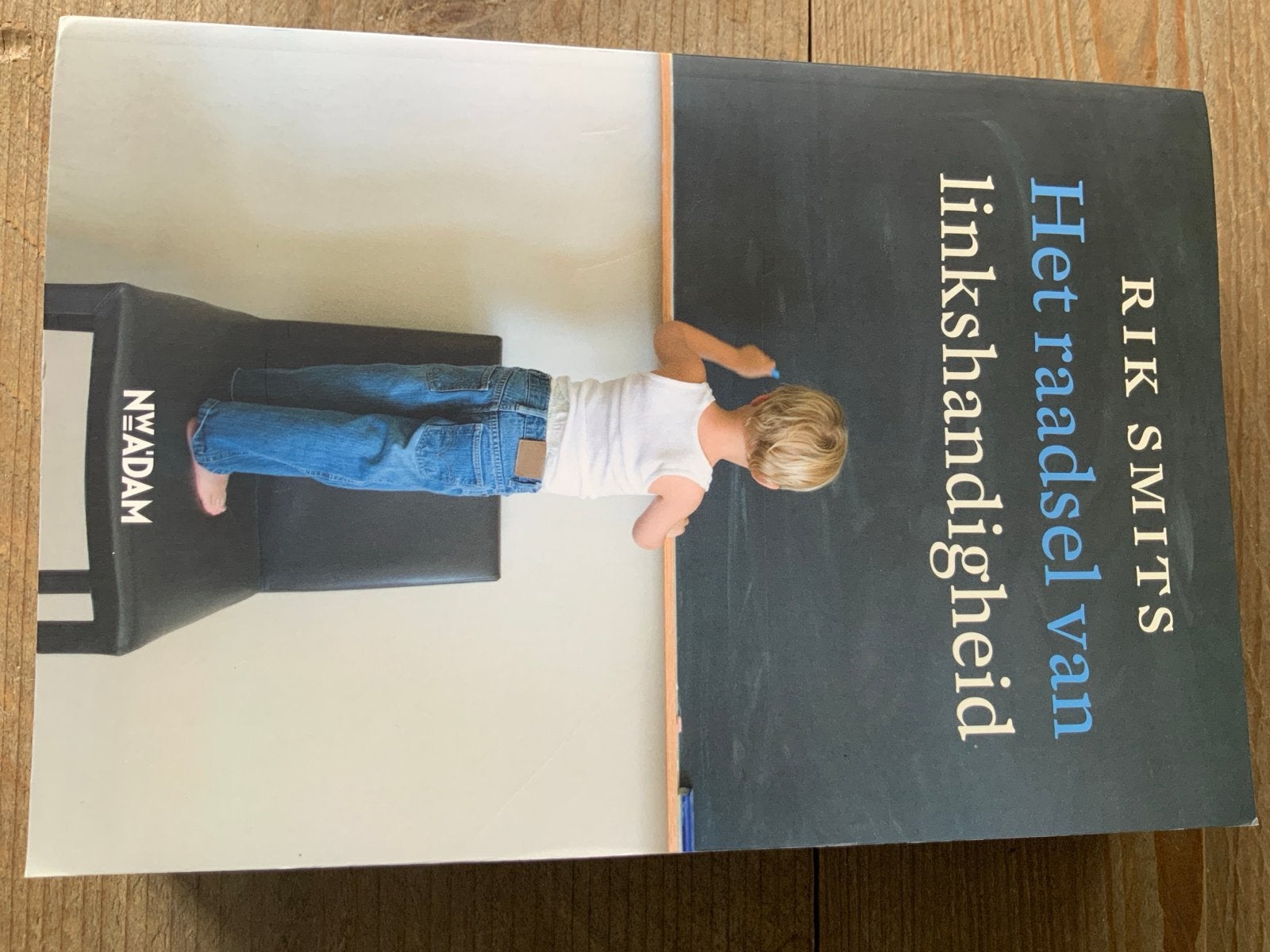 Het raadsel van linkshandigheid - Rik Smits, Boeken, Ophalen, Zo goed als nieuw, Nederland