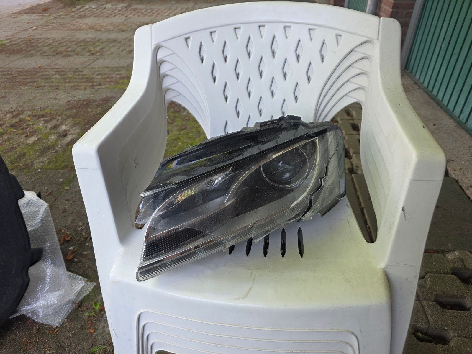 Audi a5 sportback 2010 koplamp linksvoor (behuizing stuk), Ophalen, Gebruikt, Audi