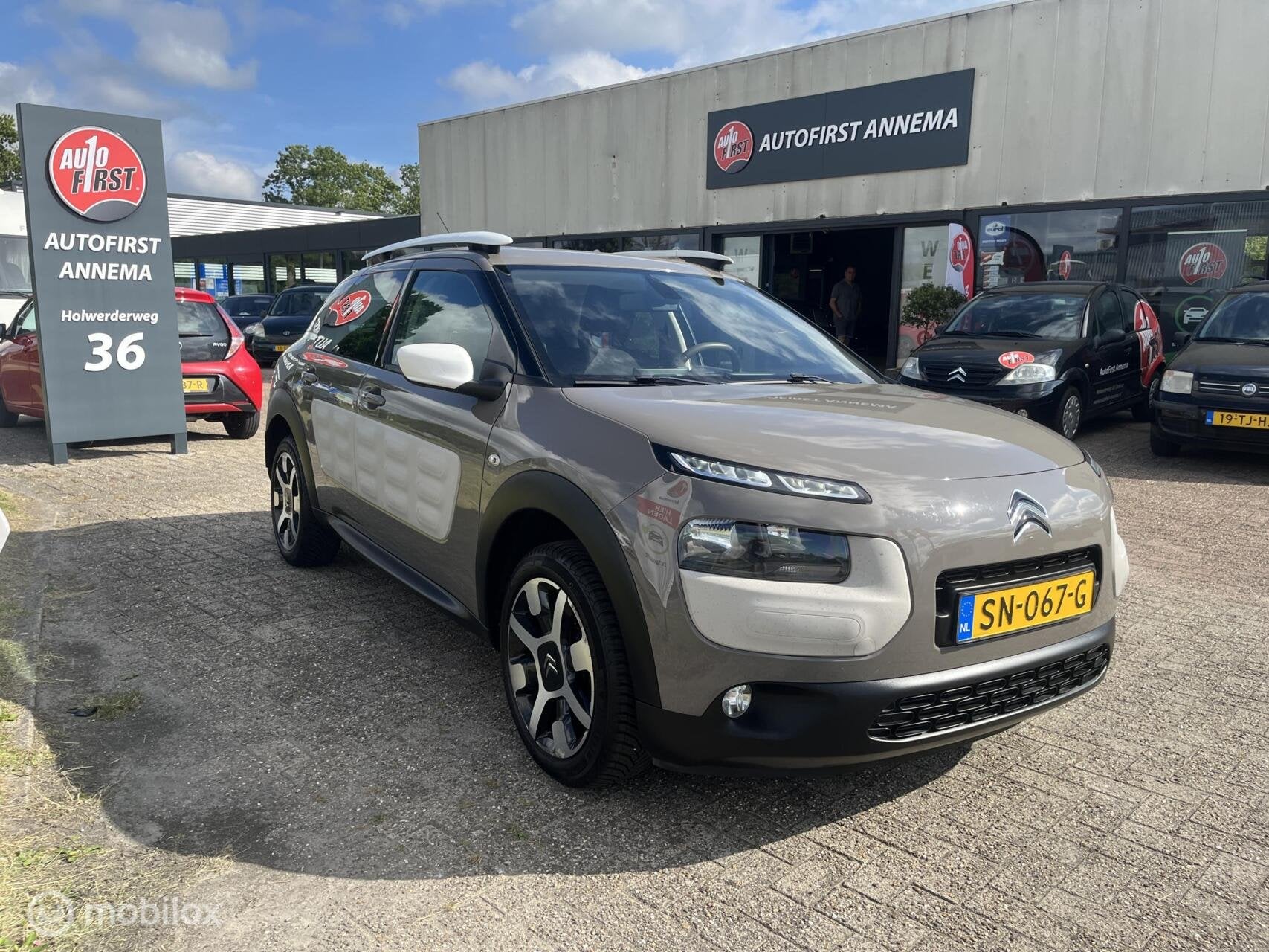 Citroen C4 Cactus 1.2 VTi Feel 207316 km met trekhaak., Voorwielaandrijving, Euro 5, Stof, Gebruikt