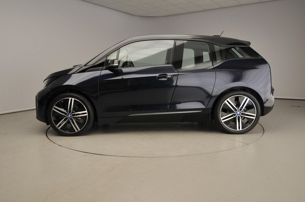 BMW i3 Executive Edition 120Ah 42 kWh LED | Navigatie | Stoe, Auto's, BMW, Automaat, 12 maanden, Gebruikt, Grijs