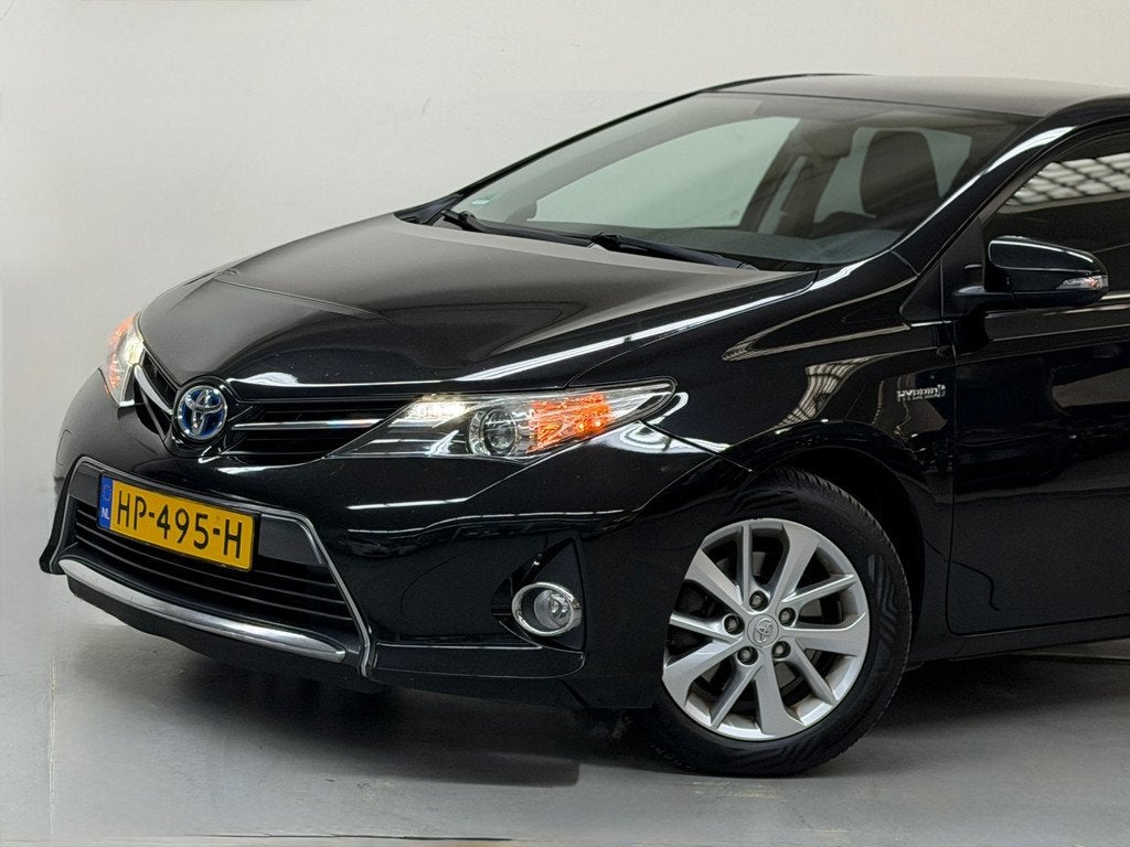 Toyota Auris 1.8 Hybrid Lease+ PANO Camera DealerOnderhouden, Euro 5, Stof, Gebruikt, Zwart