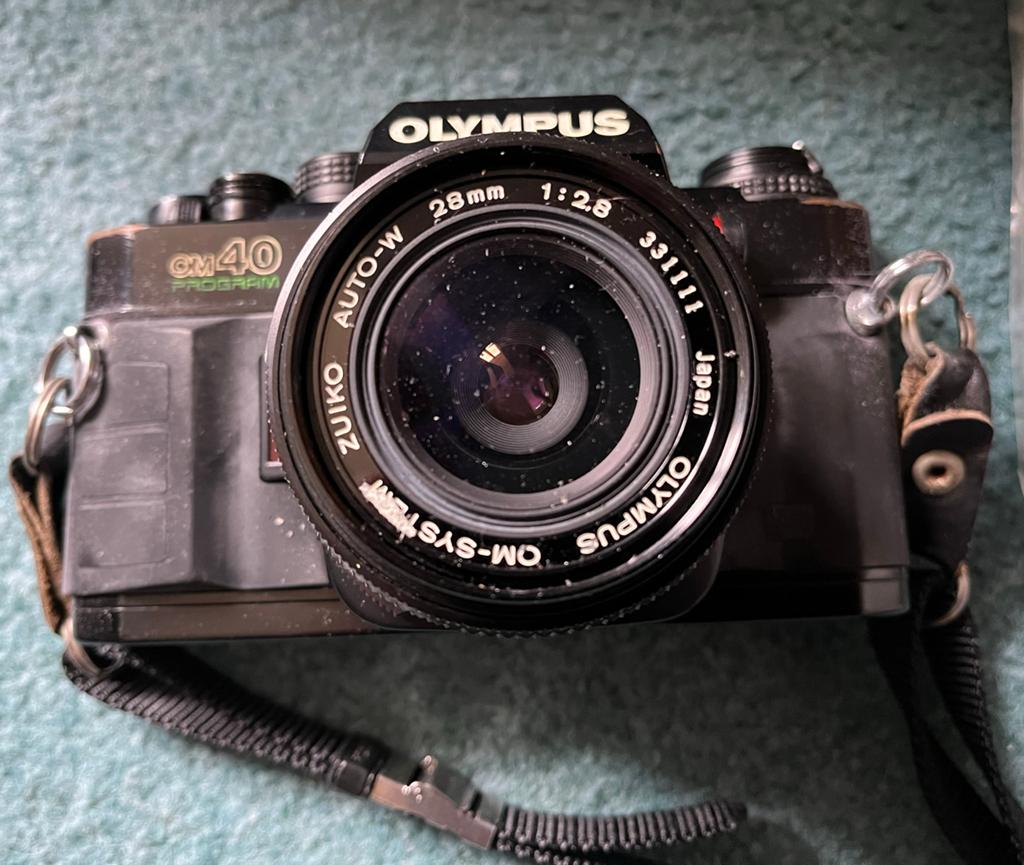 Olympus OM-40 Program Spiegelreflexcamera met lenzen, Ophalen of Verzenden, Gebruikt, Spiegelreflex, Olympus