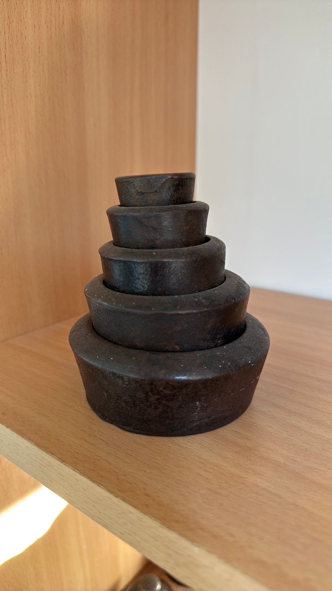 Set oude stapelbare gewichten., Ophalen