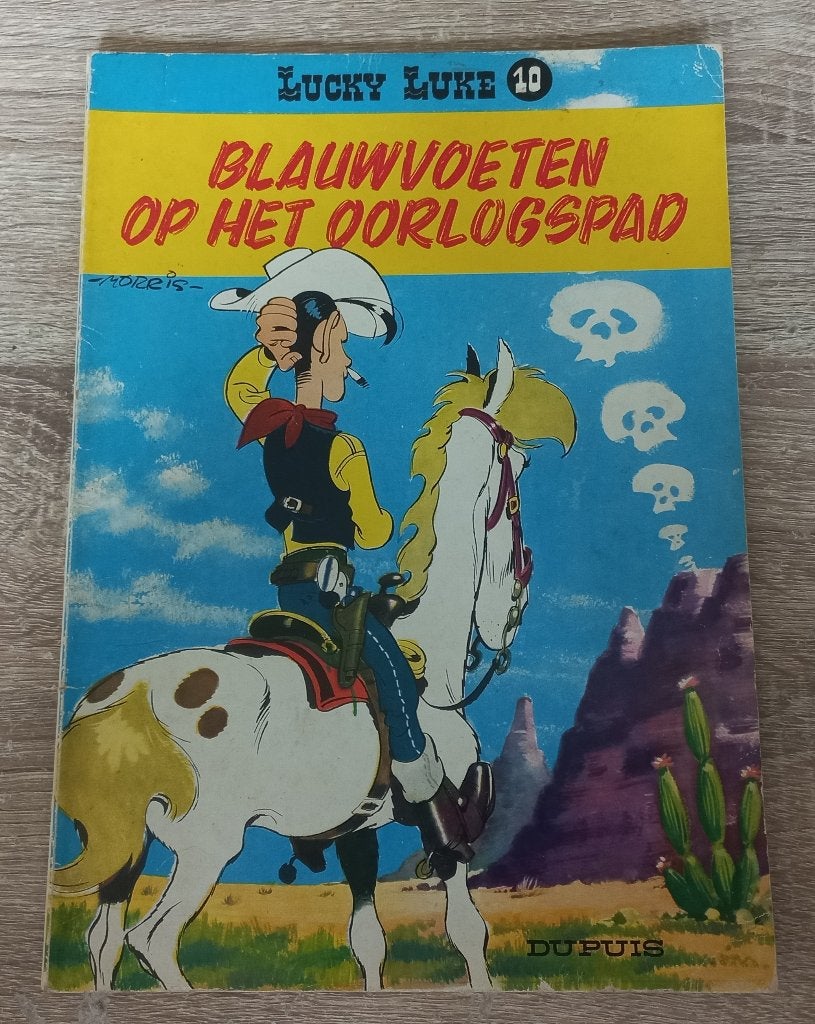 Lucky Luke Blauwvoeten op het oorlogspad (Dupuis 10, 1977), Gelezen, Eén stripboek, Ophalen of Verzenden, Morris