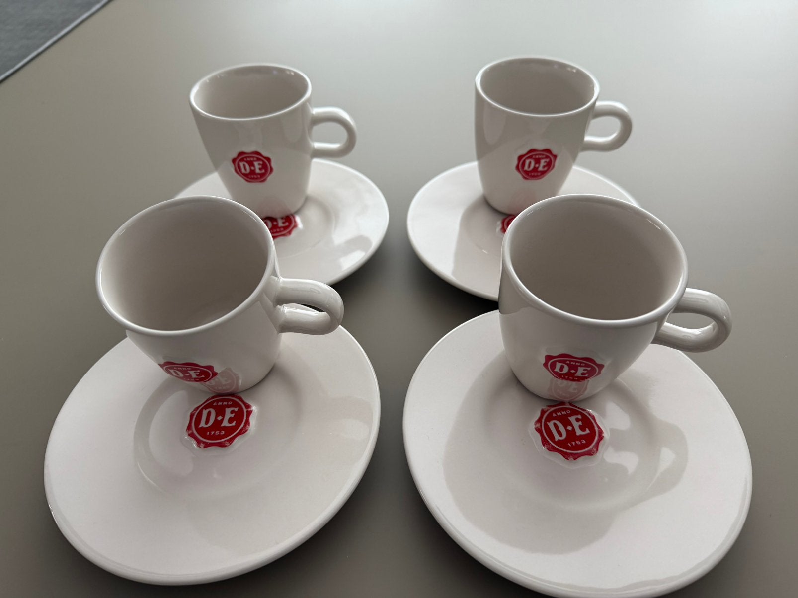 Douwe Egberts Espresso kop en schotel, Ophalen of Verzenden, Zo goed als nieuw, Porselein, Kop en/of schotel