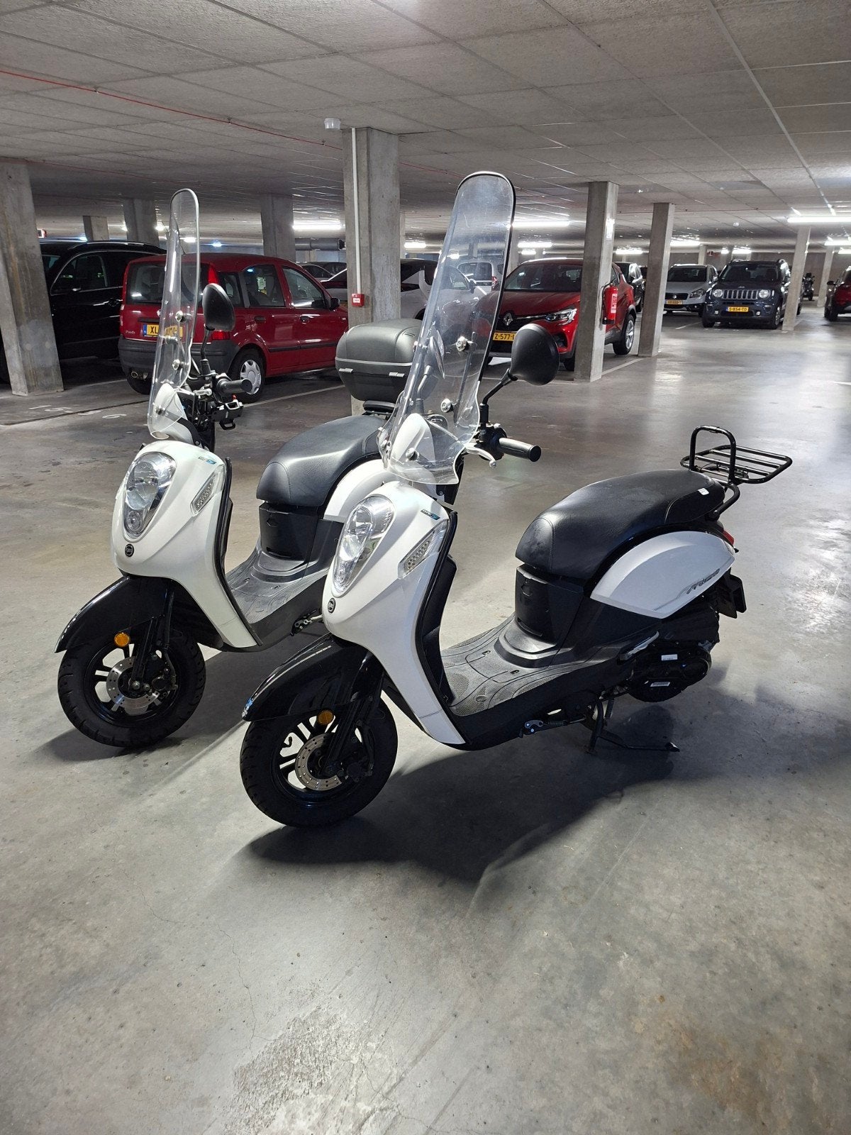 2 Sym mio scooters 50 i, per stuk €1350, Ophalen, Sym mio 50i, Zo goed als nieuw, Benzine