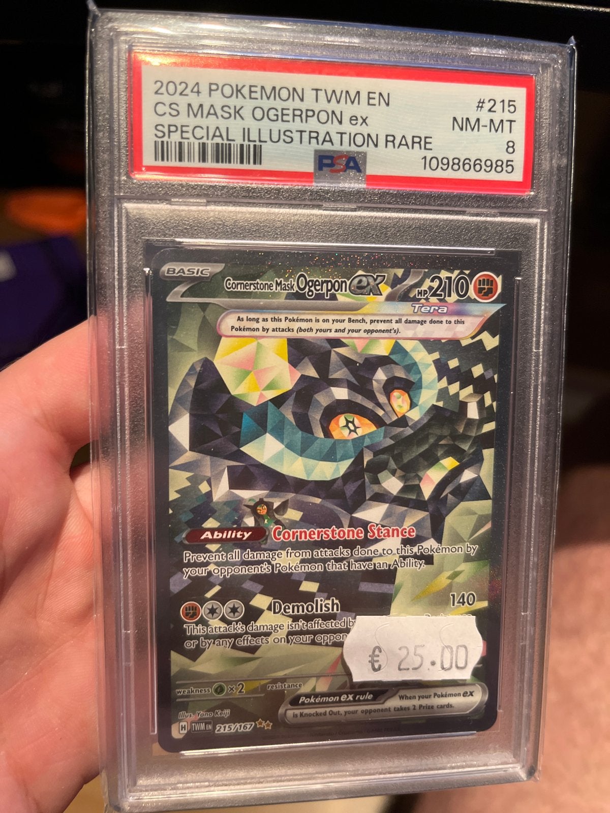 PSA 8 Cornerstone Mask Ogerpon ex #215 Pokemon kaart, Ophalen of Verzenden, Zo goed als nieuw, Losse kaart