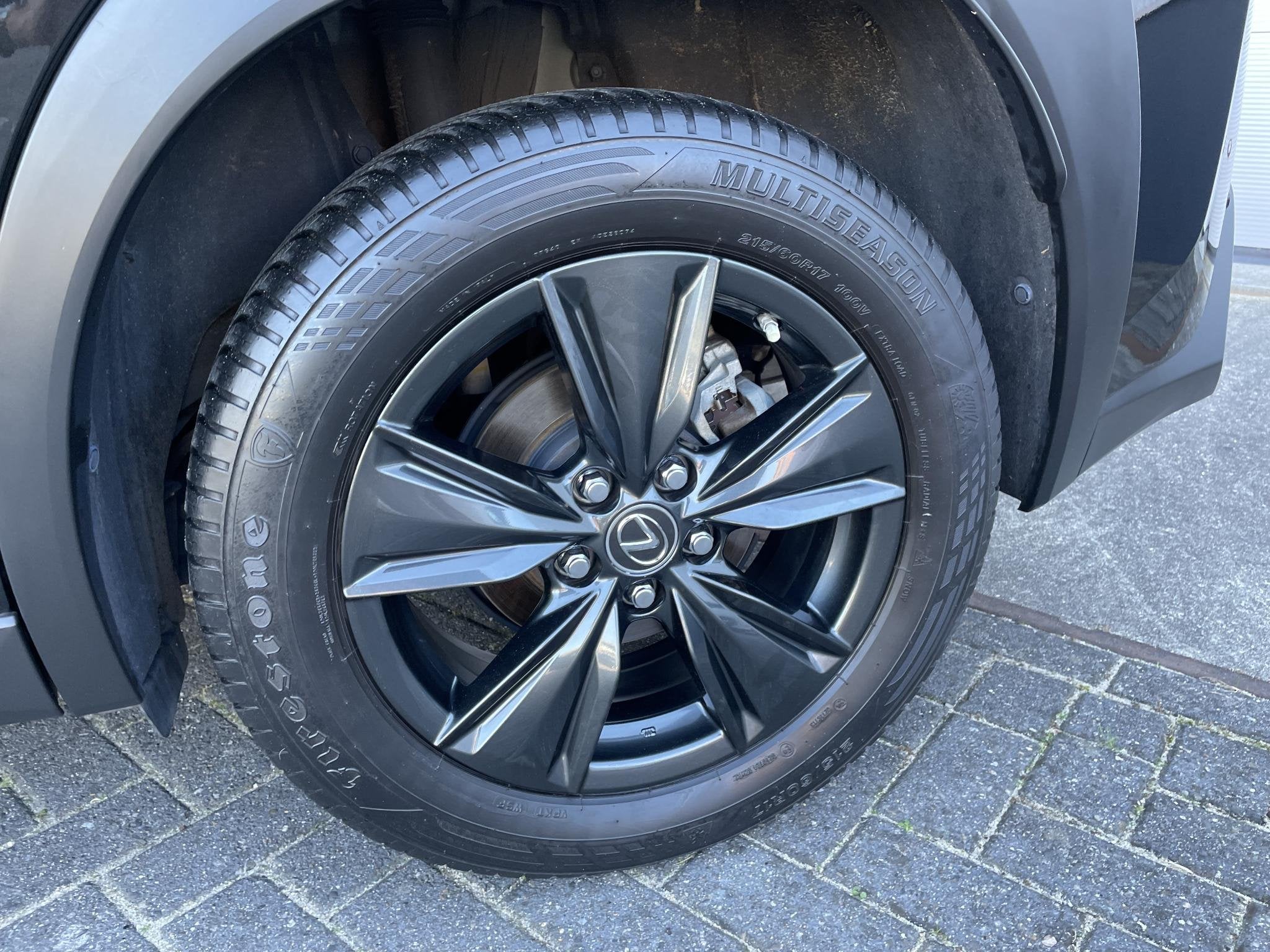 Lexus UX 250h Luxury Line | Stoelverwarming | Parkeersensore, Auto's, Stof, Gebruikt, 4 cilinders, Zwart