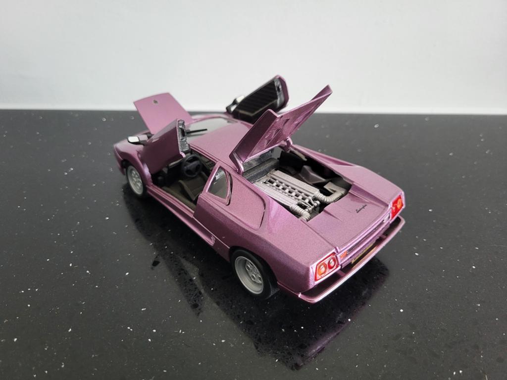Lamborghini Diablo paars 1/24 Motor Max, Ophalen of Verzenden, Zo goed als nieuw, Auto, Motormax