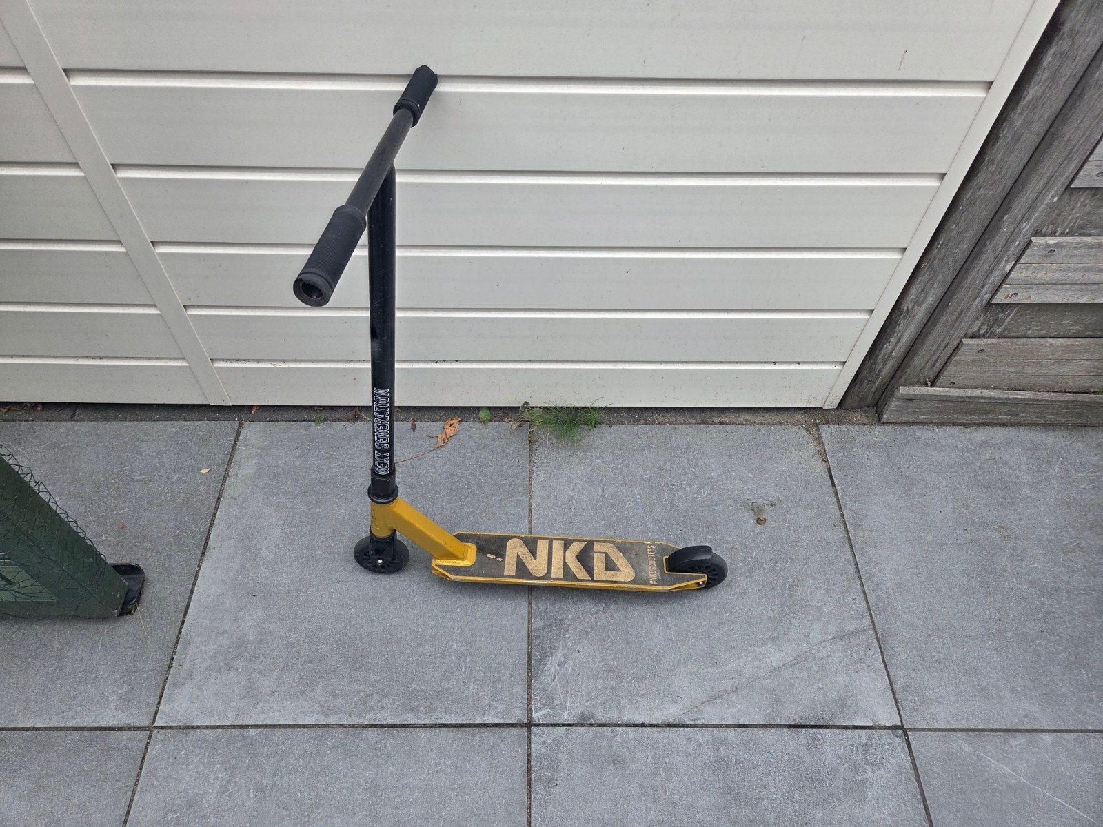 NKD Stuntstep - Geel/Zwart - Gebruikt, Fietsen en Brommers, Ophalen of Verzenden, Gebruikt, Gewone step, NKD