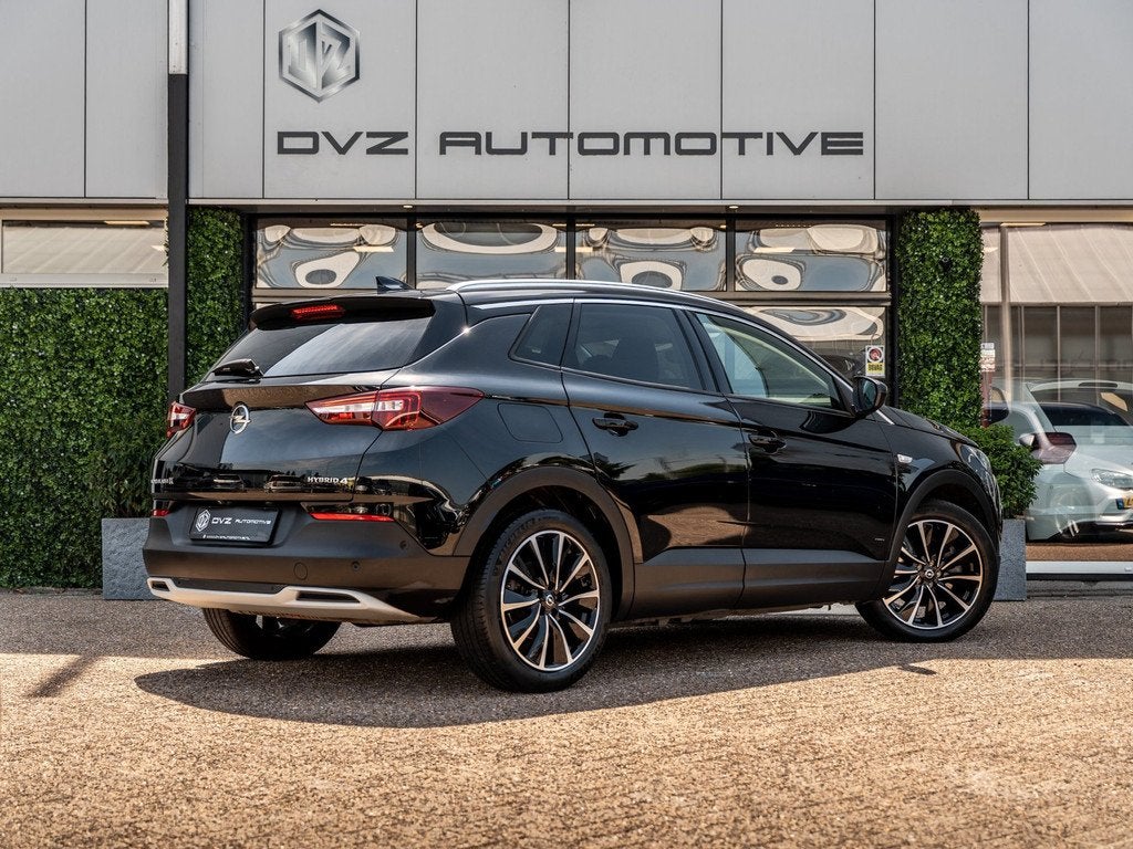 Opel Grandland 1.6 Turbo Plug-In Hybrid 4x4 Ultimate | Surro, Auto's, Opel, Grandland, Gebruikt, 4 cilinders, Zwart