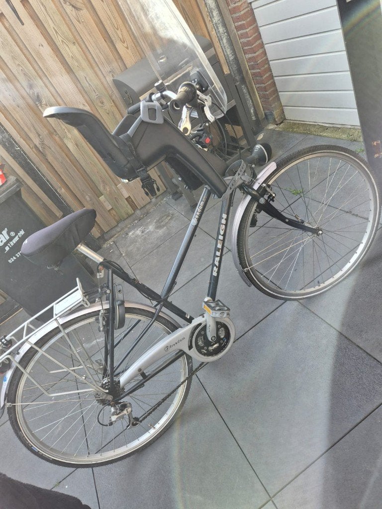 Raleigh Freedom 300 stadsfiets met kinderzitje en windscherm, Fietsen en Brommers, Fietsen | Heren | Herenfietsen, Ophalen, Gebruikt