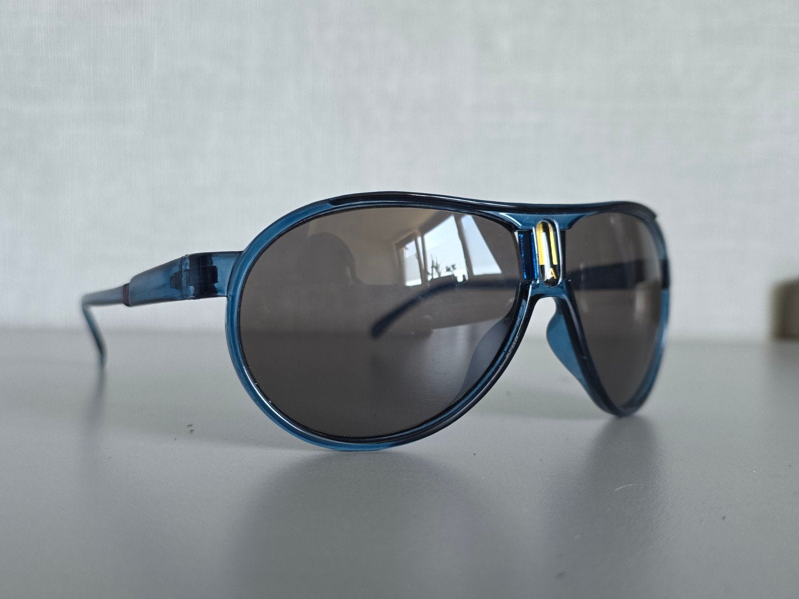 Carrera Champion65 Zonnebril – Donkerblauw / Goud, Ophalen, Zo goed als nieuw, Blauw, Overige merken