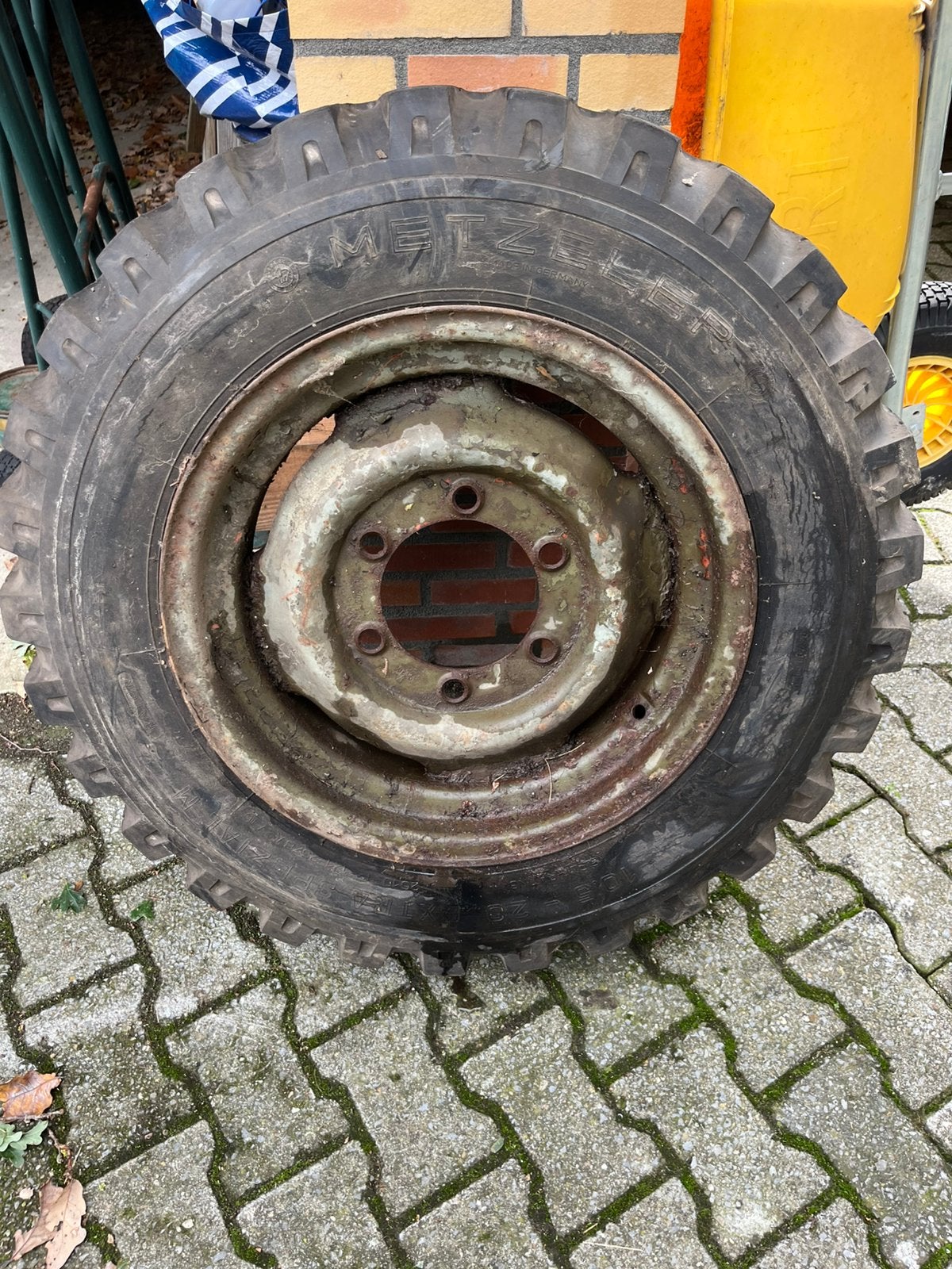 Unimog 404s velg plus band, Ophalen, Gebruikt