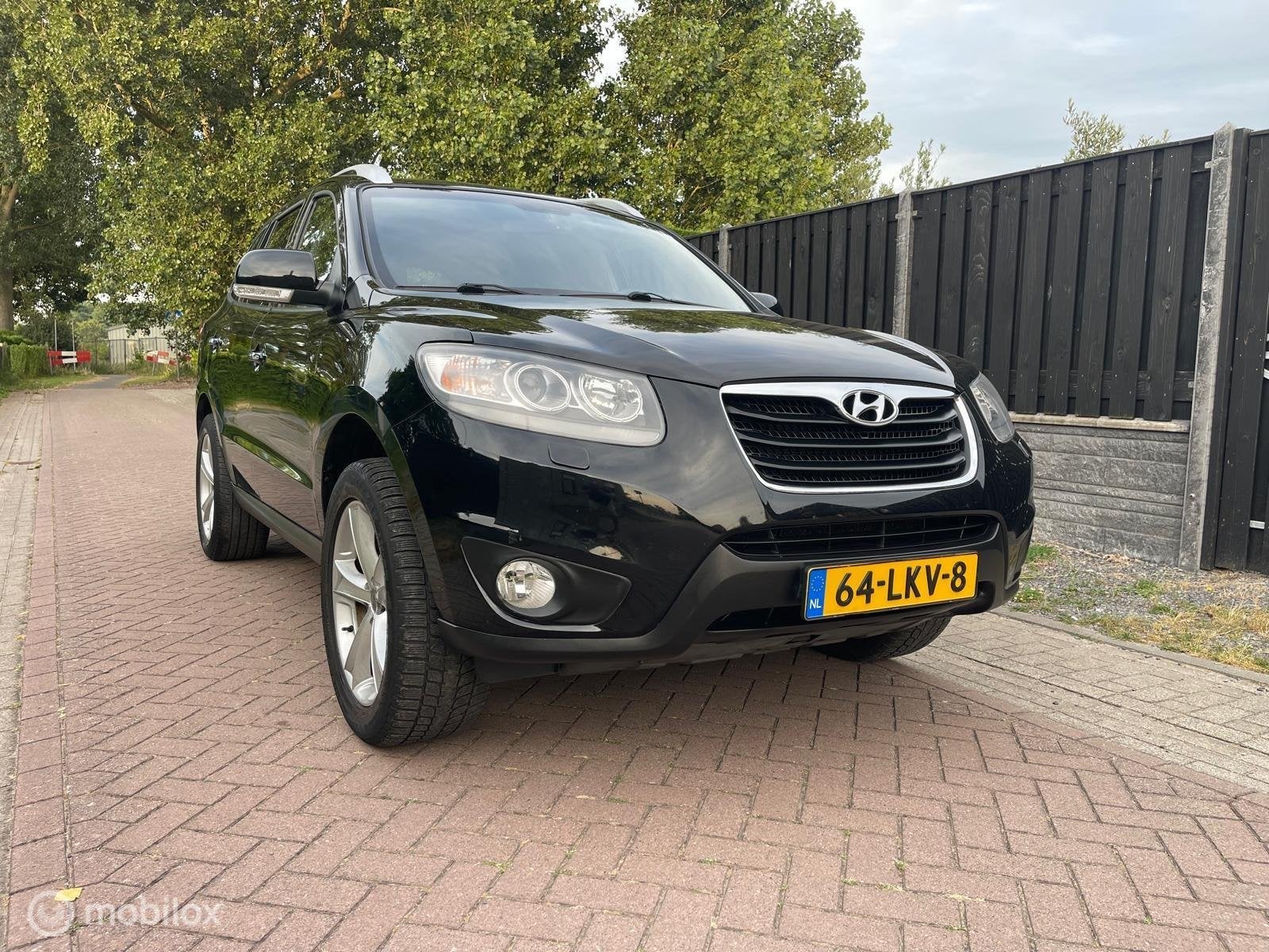 Hyundai Santa Fe 2.4i CVVT 4WD Style, Auto's, Automaat, Gebruikt, 4 cilinders, 2000 kg
