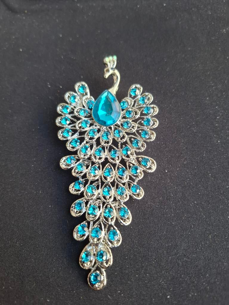 Elegante Pauw Broche met turquoise strassteentjes, Overige materialen, 4 tot 7 cm, Nieuw, Ophalen of Verzenden