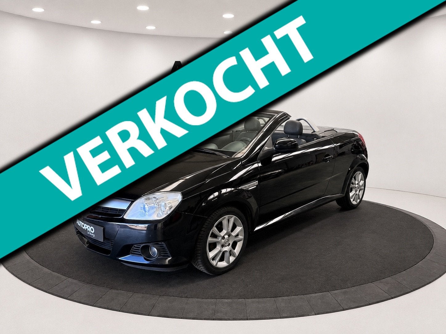 Opel Tigra TwinTop 1.4-16V Enjoy, Voorwielaandrijving, Gebruikt, Zwart, 4 cilinders