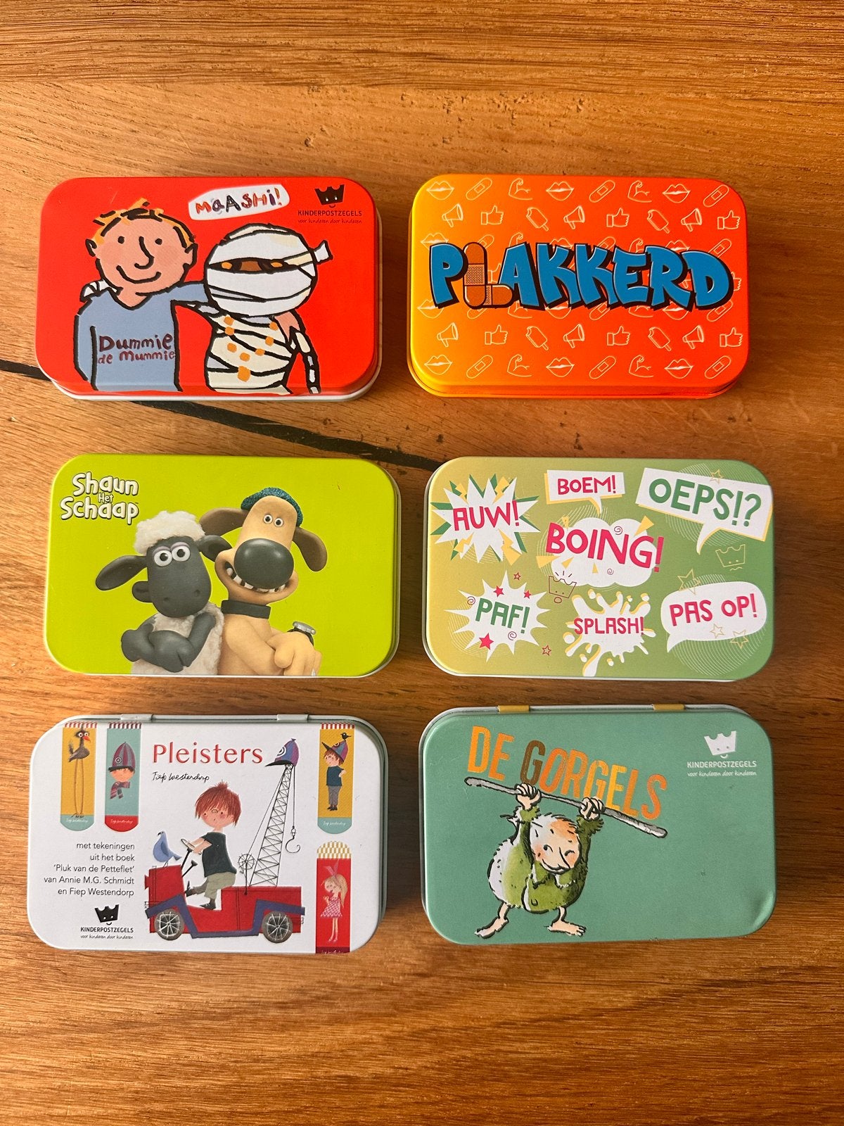 6 Kinderpostzegels blikjes met pleisters, Ophalen of Verzenden, Zo goed als nieuw