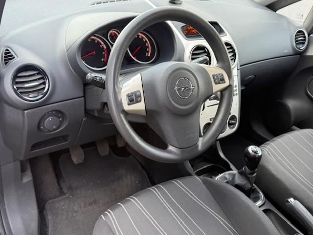 Opel Corsa 1.2-16V Business Airco|Cruise|Nieuw apk!, Voorwielaandrijving, Stof, Gebruikt, Zwart