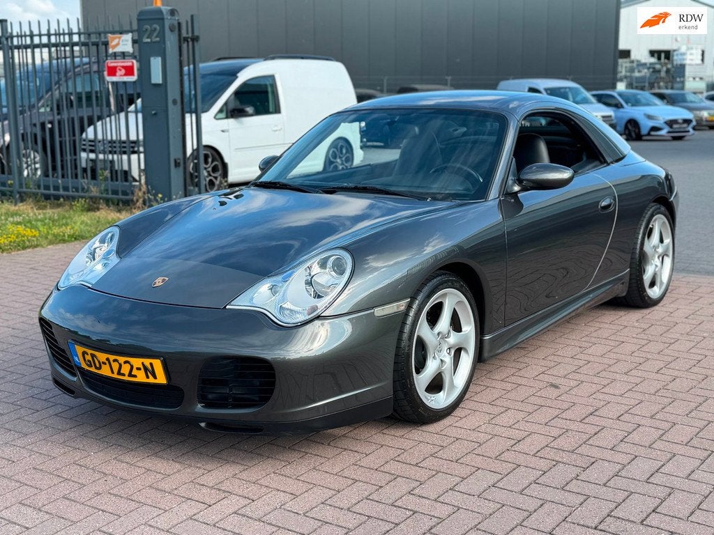 Porsche 911 Cabrio 3.6 Carrera 320PK Aero Pack Af fabriek 1e, Auto's, Porsche, Automaat, Achterwielaandrijving, Gebruikt, Zwart