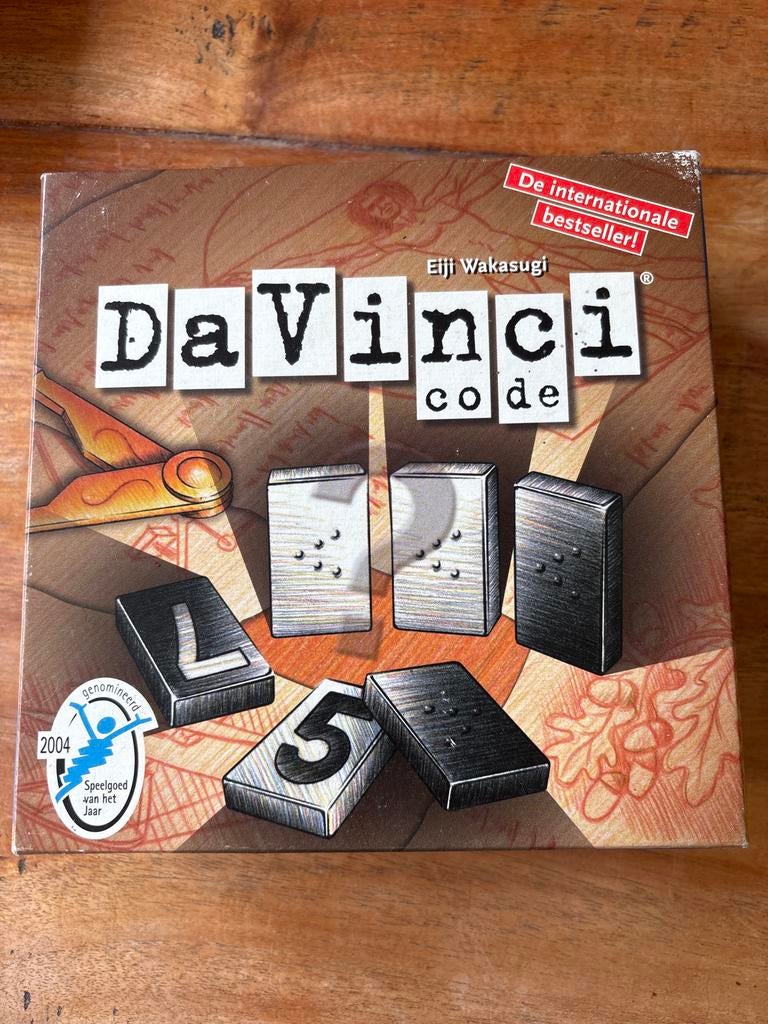 Da Vinci Code Bordspel - Kraak de Geheime Code!, Hobby en Vrije tijd, Gezelschapsspellen | Overige, Een of twee spelers, Ophalen of Verzenden