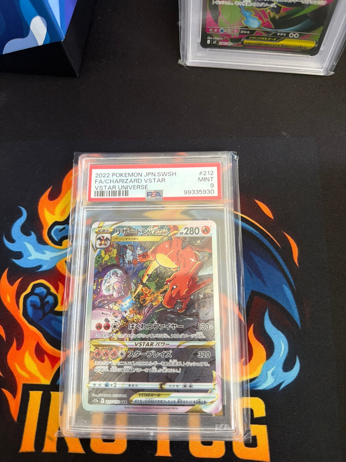 Charizard VSTAR 212 PSA 9, Ophalen of Verzenden, Zo goed als nieuw, Losse kaart