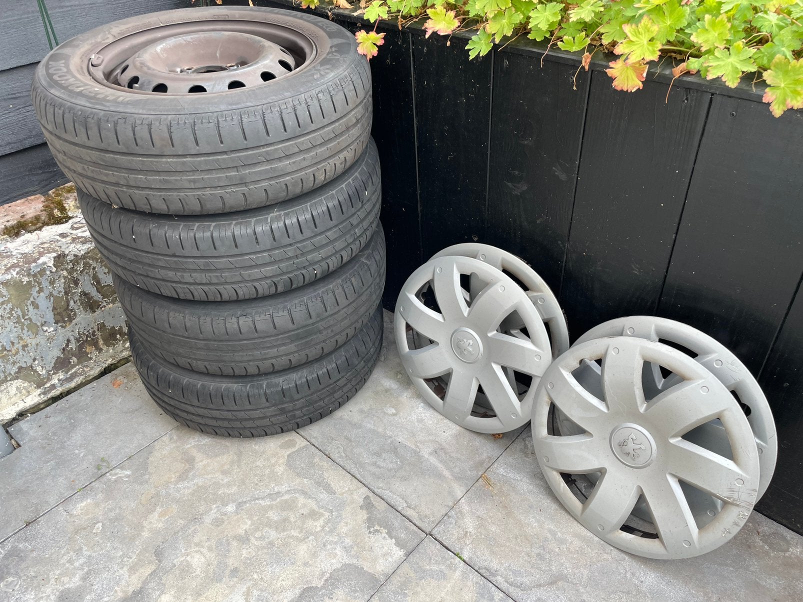Peugeot 206 14 inch velgen met wieldoppen, Ophalen, Gebruikt