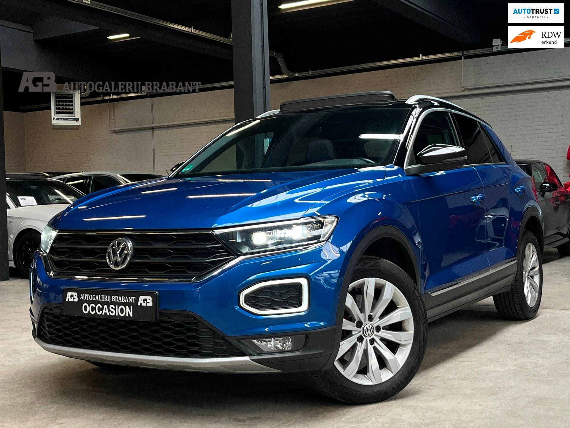 Volkswagen T-Roc 1.5 TSI Sport *Pano/Carplay/Stoelverwarming, Auto's, Euro 6, 4 cilinders, 150 pk, Blauw