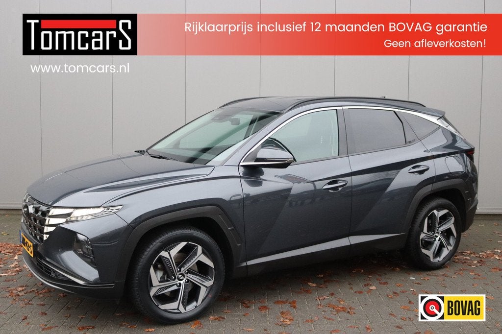 Hyundai Tucson 1.6 T-GDI PHEV Comfort Smart 4WD Winter-Pack/, Auto's, Stof, Gebruikt, Euro 6, 4 cilinders