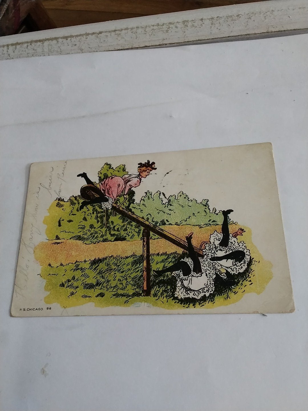Antieke ansichtkaart: Meisjes op wip, gestempeld 1909, Ophalen of Verzenden, Voor 1920