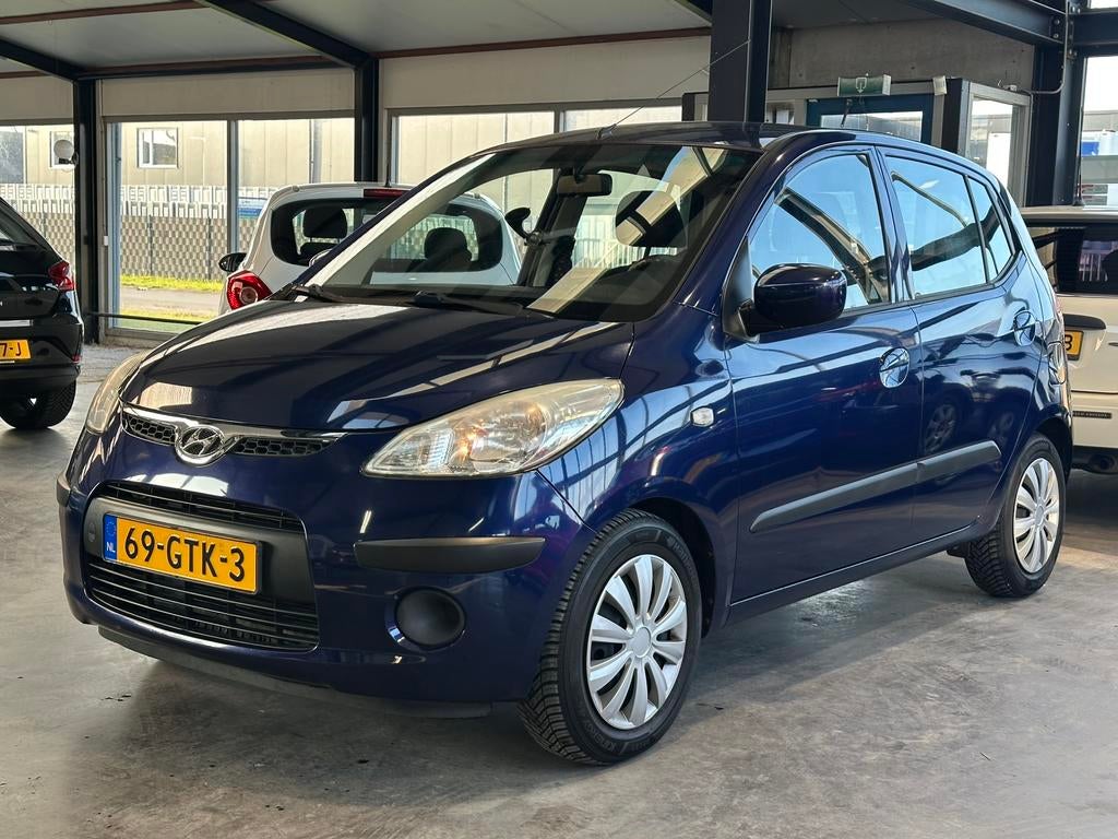 Hyundai i10 1.1 Dynamic Cool - Elk. Uitvoering - Airco - AUX, Voorwielaandrijving, Euro 5, Stof, 4 cilinders