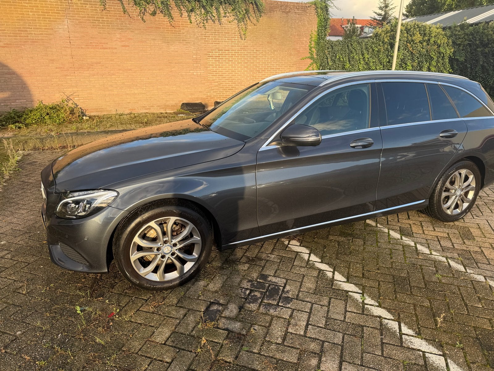 Mercedes-Benz C-Klasse C200 2.0 135KW Aut7 Estate 2016 Grijs, Achterwielaandrijving, 1800 kg, Particulier, 1405 kg