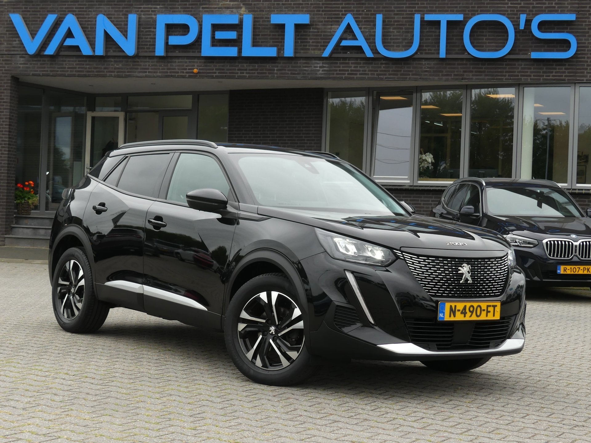 Peugeot 2008 1.2 PureTech Allure, Auto's, 101 pk, Gebruikt, 1199 cc, Leder en Stof