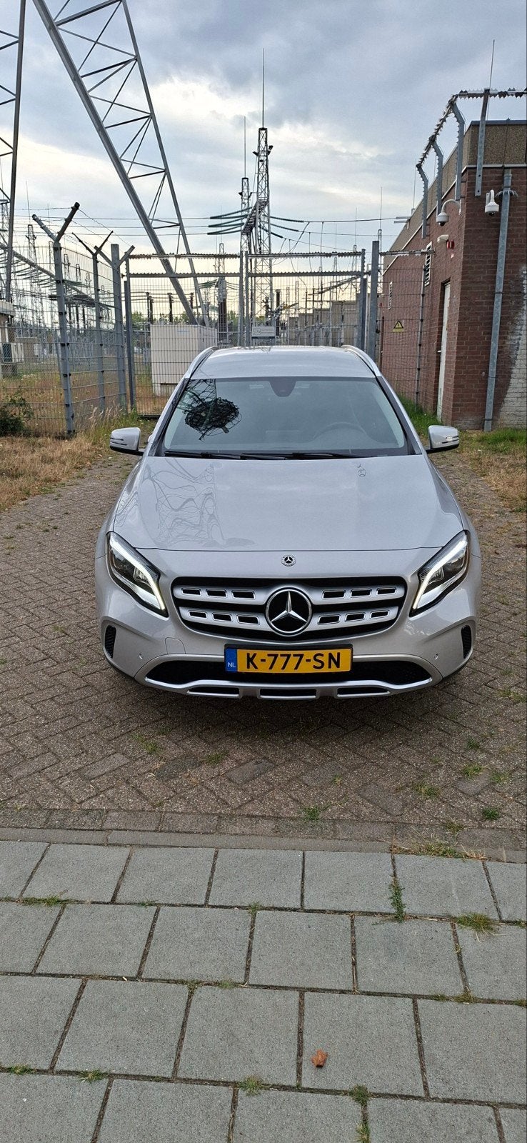 Mercedes-Benz GLA Gla180 1.6 90KW Aut7 2017 Grijs, Auto's, Stof, Zwart, 4 cilinders, 715 kg