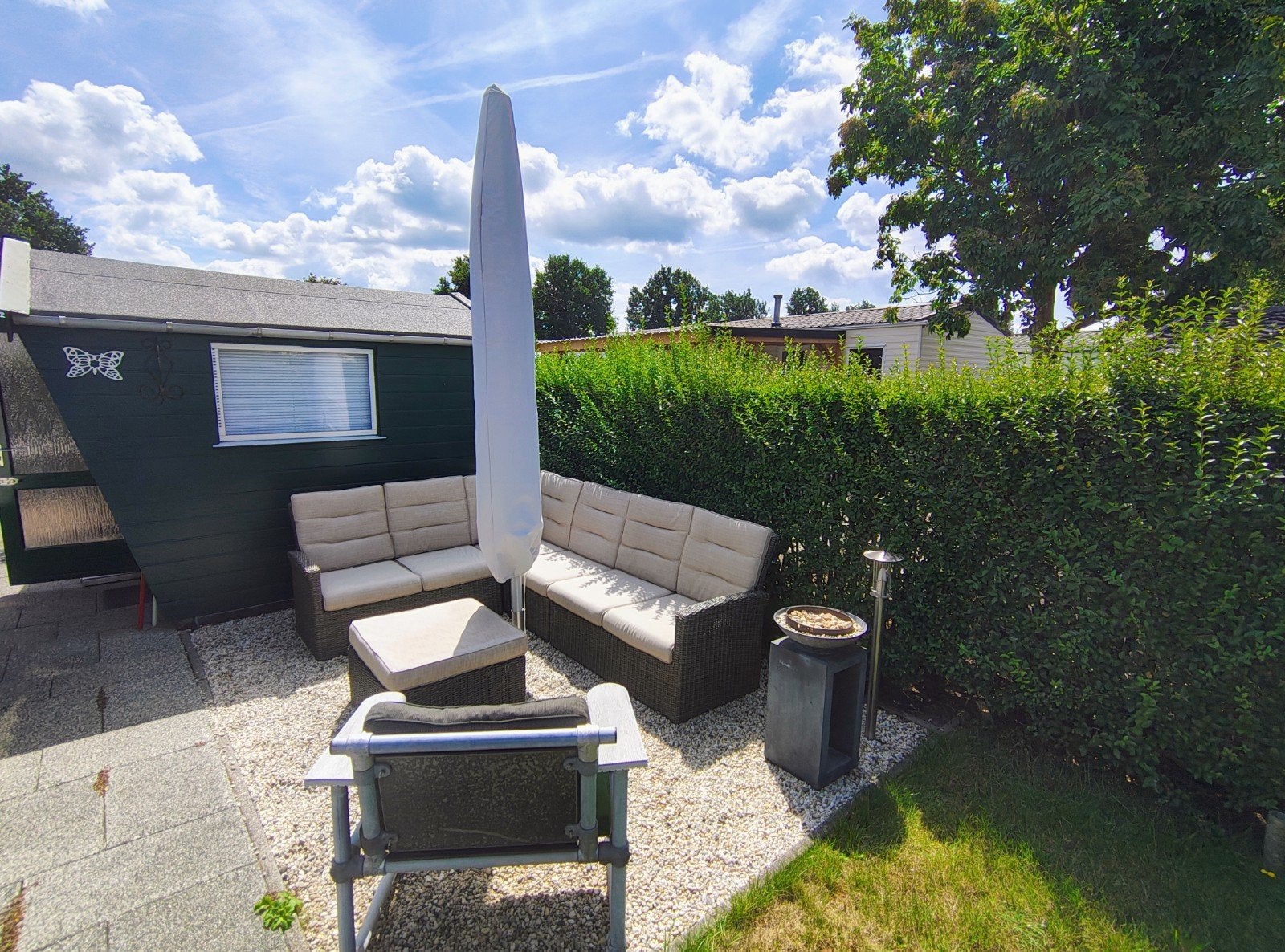 Solero parasol met grondanker en hoes., Ophalen