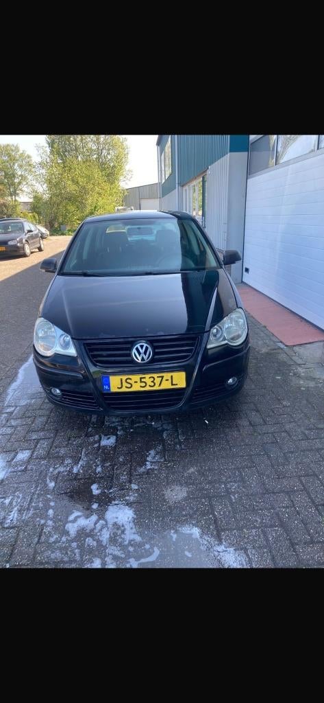 Volkswagen Polo 1.2 47KW 2007 Zwart, Auto's, Voorwielaandrijving, Stof, 540 kg, 1198 cc