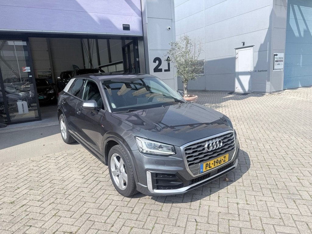 Audi Q2 1.0 TFSI S-Line Automaat! NETTE AUTO! NAP! INRUIL MO, Gebruikt, Origineel Nederlands, Bedrijf, 650 kg
