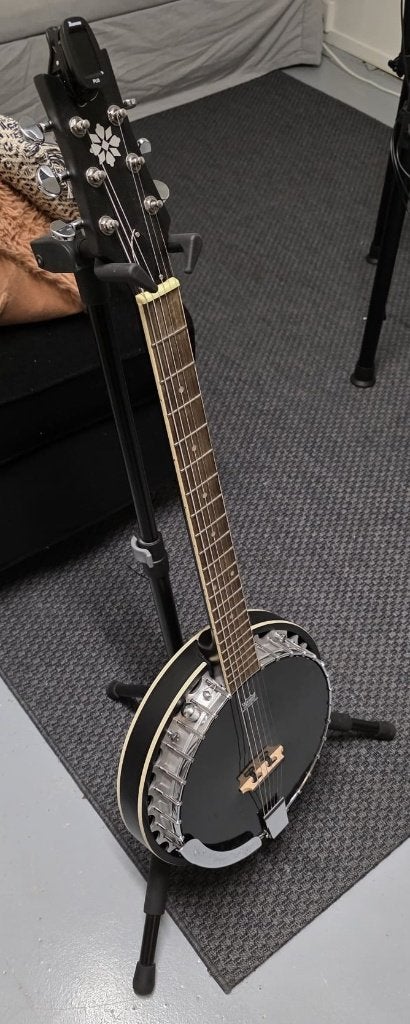Ortega OBJE356-SBK (banjo-gitaar/banjitar), Ophalen