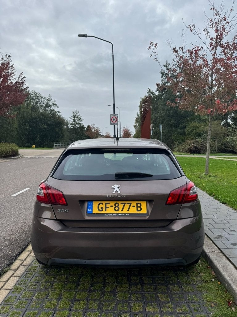 Peugeot 308 1.2VTI 60/82 5-D 2015 Bruin, Voorwielaandrijving, Stof, 40 €/maand, 750 kg