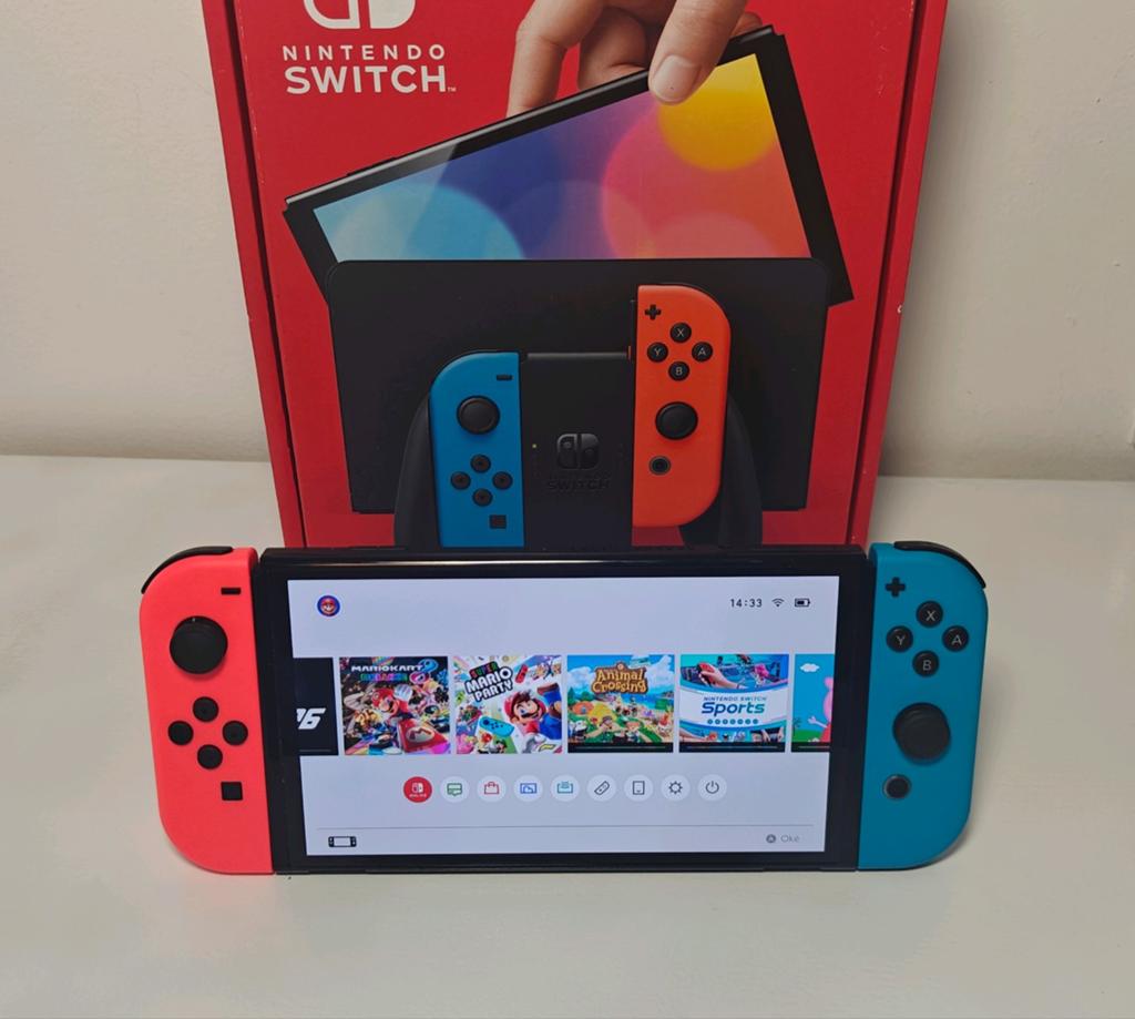 Nintendo Switch OLED, Spelcomputers en Games, Ophalen of Verzenden, Zo goed als nieuw, Met 2 controllers, Switch OLED