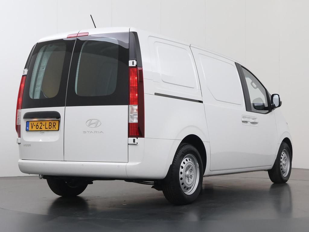 Hyundai Staria 1.6 T-GDI | AUT. | HEV | HYBRIDE | BENZINE |, Stof, Gebruikt, 4 cilinders, Wit