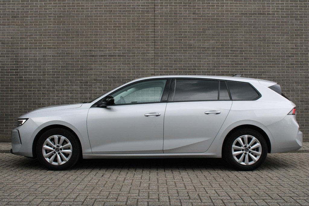Opel Astra Sports Tourer 1.2 Level 2 Cruise en Climate Contr, Voorwielaandrijving, 12 maanden, Stof, Gebruikt